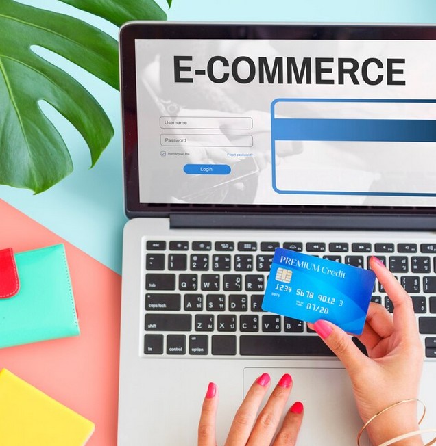 Advertising & Marketing Content Solutions Woman with a PC Shows E-Commerce label