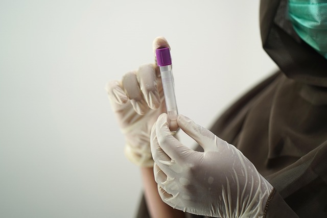 a doctor holding in hand an injection