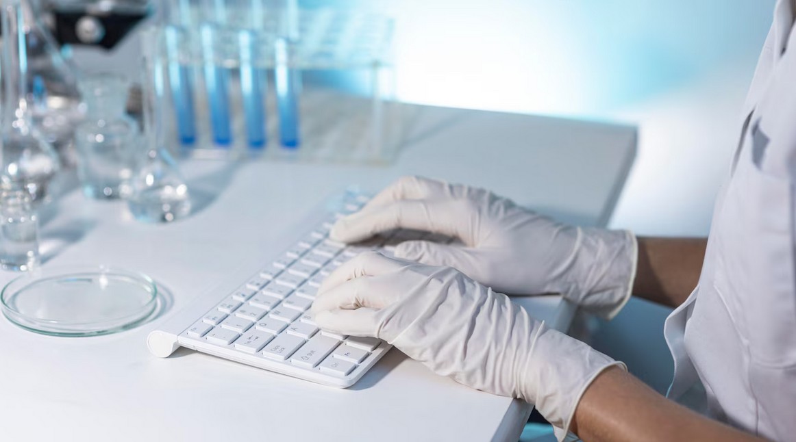 Biotechnology Translation Services a resaercher using a laptop in a biotech research