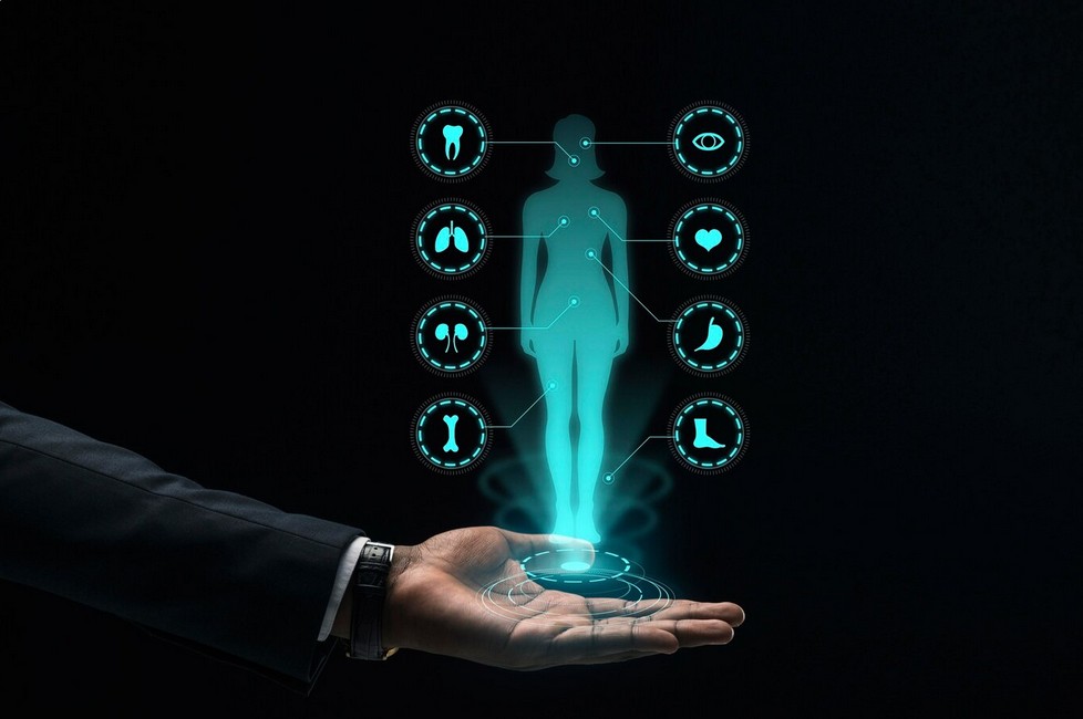a hand holding a glowing human body