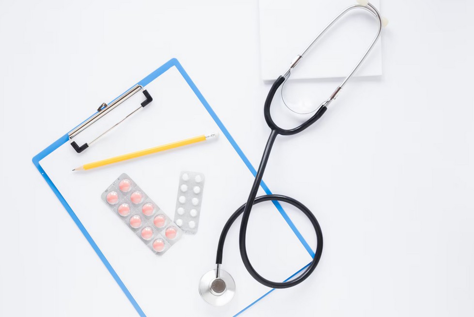 Pharmaceutical Translation Services stethoscope and pills.