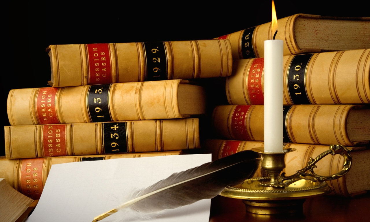 The Ultimate Guide to Mastering Global Legal Translation Services. an image showing low books