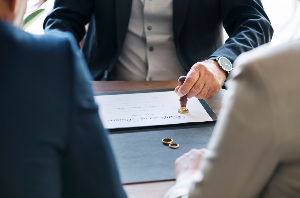 The Ultimate Guide to Mastering Global Legal Translation Services. empoyee certifieng a document