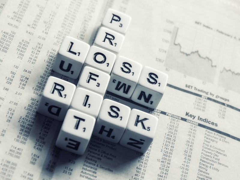 The Hidden Cost of Ambiguity: 5 Real-World Financial Translation Disasters. image showing financial concepts written on dice cubes