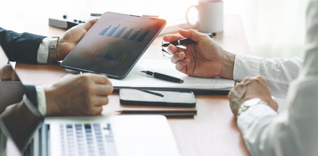 Go Global with Confidence: Expert Fintech Translation for Seamless Expansion. managers discussing a financial project