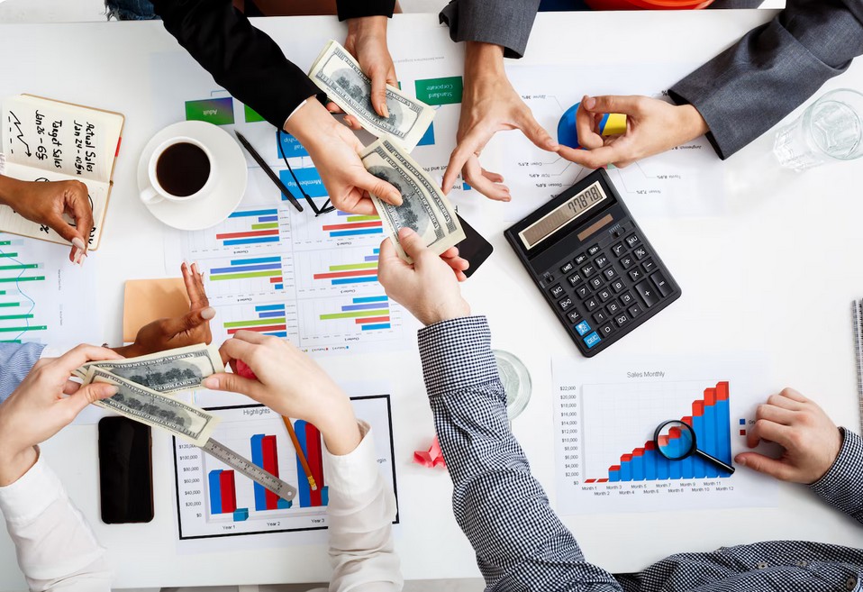Go Global with Confidence: Expert Fintech Translation for Seamless Expansion. employees working at a financial company office