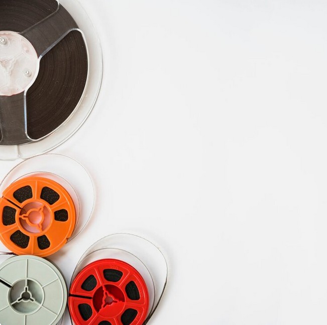 AI-Powered Localization: The New Frontier of Multimedia Translation. film reels of different colors