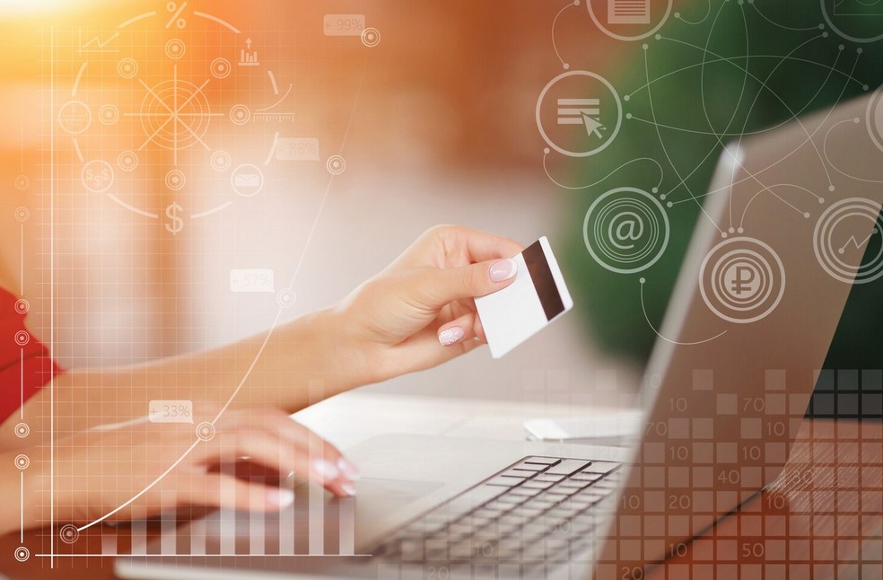Transcreation vs. Translation: The Ultimate Guide for Fintech Marketing. a woman using a credit card for online purchase