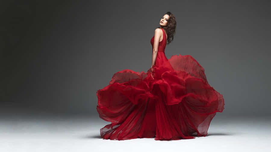 The Ultimate Guide to Winning New Markets with Retail Localization. a dancer woman in red