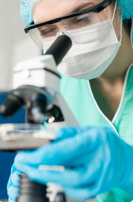 Beyond Terminology: Expert Translation for Your Most Critical Life Science Documents. a doctor using a microscope