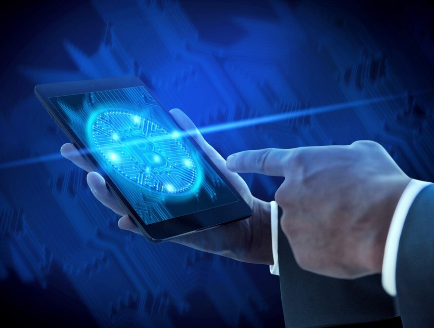 Transcreation vs. Translation: The Ultimate Guide for Fintech Marketing. man holding a smartphone on hand with blue screen
