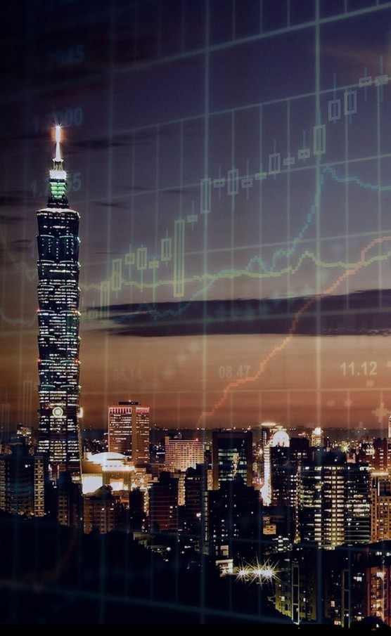 The Ultimate Guide to Launching a Multilingual Banking Website. a city at night and banking data appears in the background