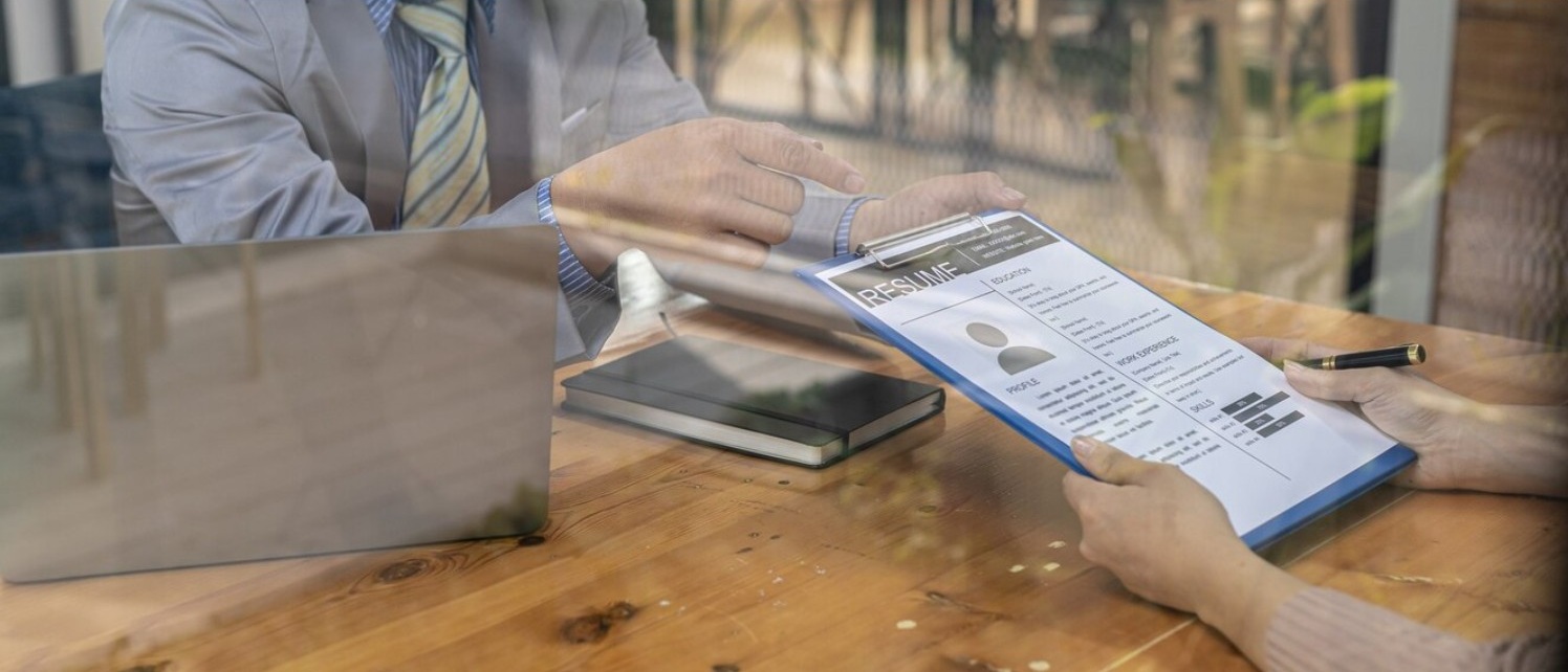 Maximize ROI: How to Request a Life Science Translation Quote That Delivers. a manager checking a candidate resume