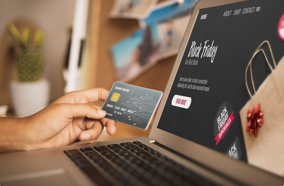 Localization is not Translation. It's Your Global Brand's Survival Kit. person making online purchase using a credit card