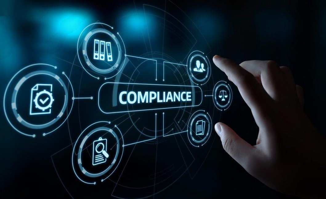 What is Life Science Translation? | The Need for Specialization. a person touching a virtual screen which displays the word compliance