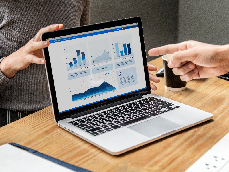 Unleash Asia: The Ultimate Guide to Fintech App Localization. laptop displaying banking data