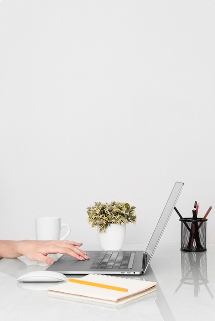The Ultimate Strategic Guide to Conquering Global Markets: How to Choose a Retail Translation Services Partner. a worktable with a laptop on it