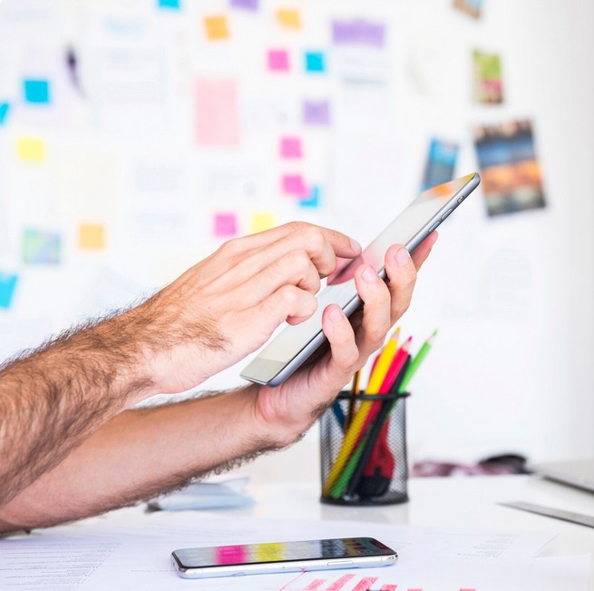 Multilingual SEO for Retail: Your Ultimate Global Blueprint. a person holding in hands a smartphone