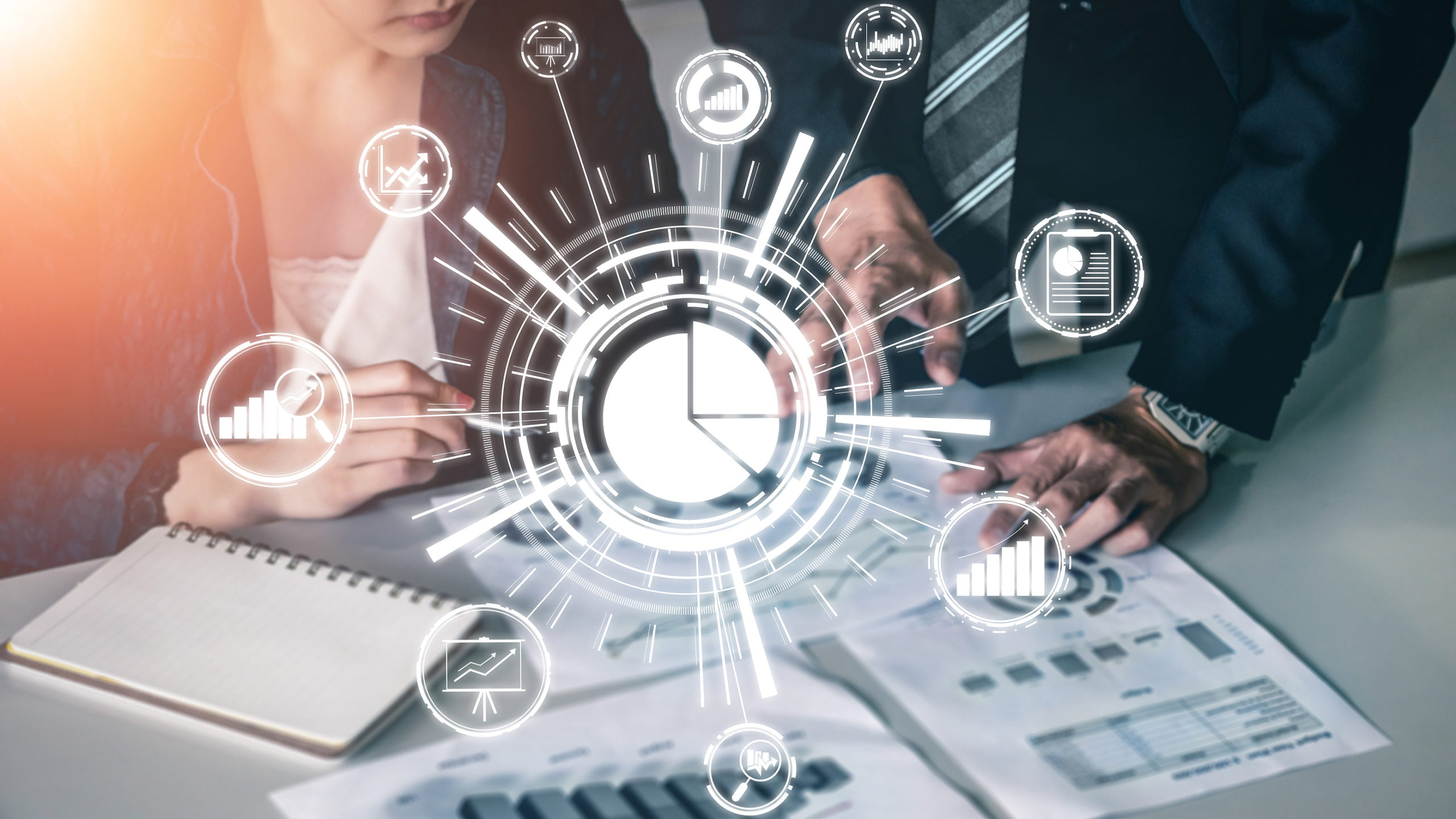 The Ultimate Guide to Launching a Multilingual Banking Website. two persons checking banking data