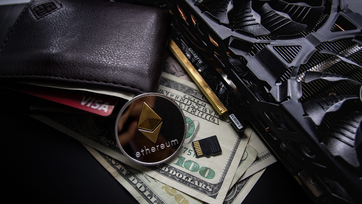 One Wrong Word: The Peril of Amateur Crypto Translation. Ethereum coin with real banknotes.