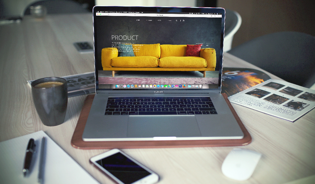 Unlocking Global Retail Success with Professional Translation Services. Laptop displaying a piece of furniture