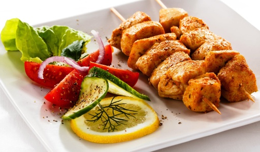 Your Ultimate Guide to Food & Drink Translation for Global Market Entry Grilled meat pieces with hot peppers
