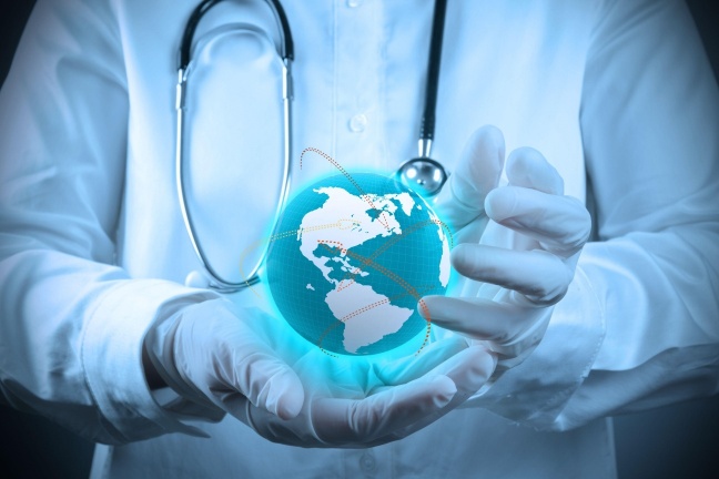 Guarantee First-Pass Regulatory Compliance Now. a doctor holding glob model in hands