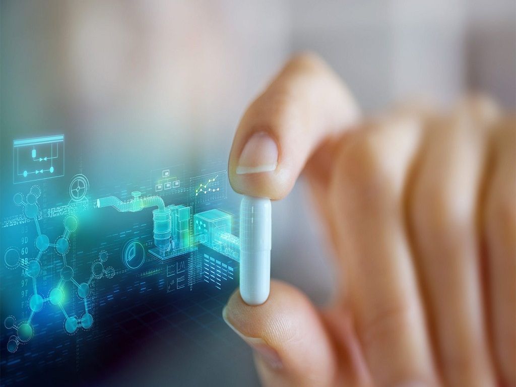 Guarantee First-Pass Regulatory Compliance Now. a person holding a medical pill