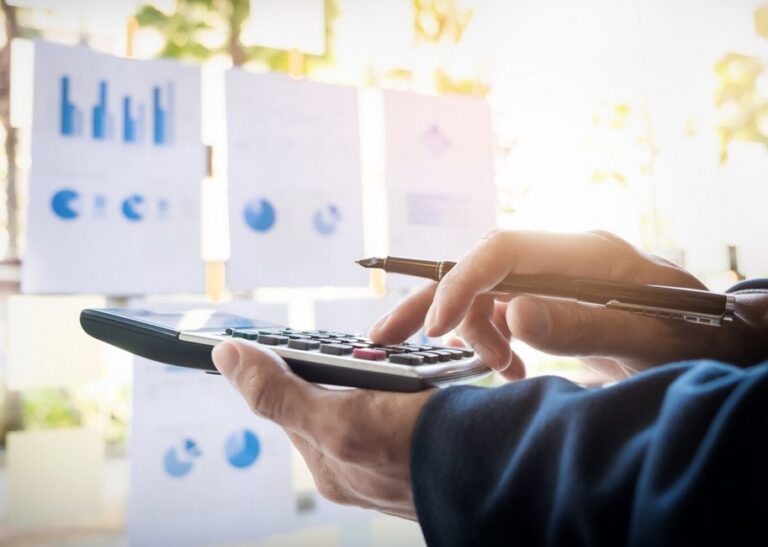 a person using a calculator